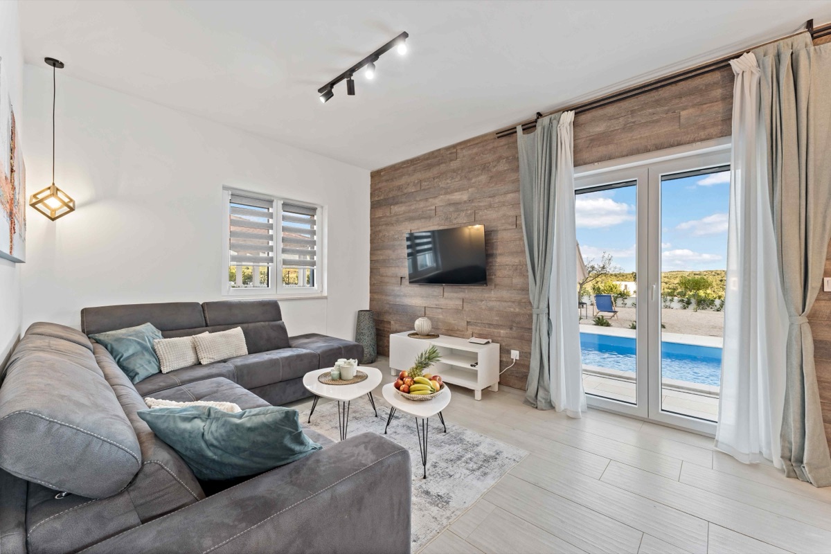Living room with pool view
